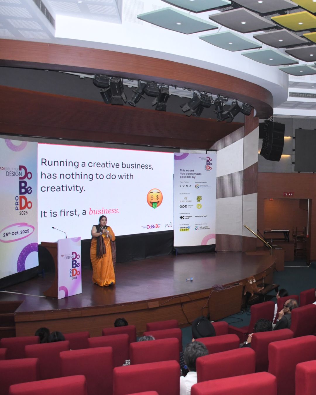 Speaking on stage at ADI Design DoBeDo 2025 — "Running a creative business has nothing to do with creativity. It is first, a business."